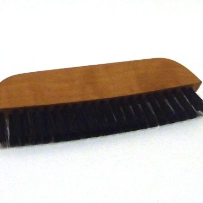 Brosse à habits de voyage