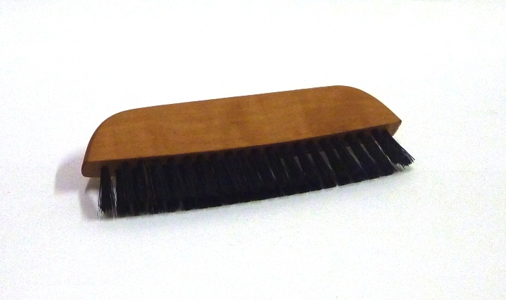 Brosse à habits de voyage